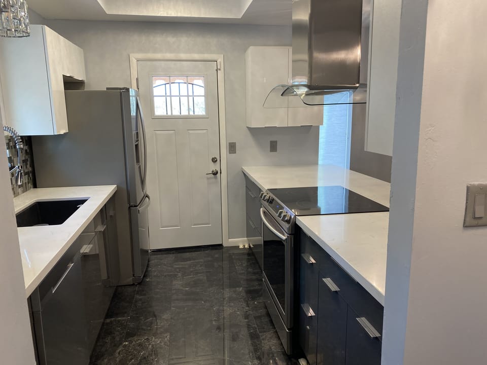 Kitchen: refrigerator, range, dishwasher, microwave