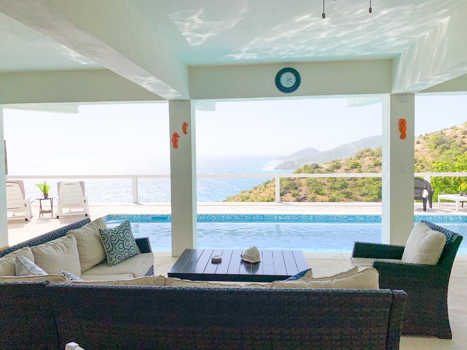 A view from the outdoor living room area by the pool! 