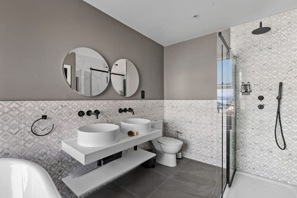 Twin basins, walk in shower with handheld attachment  - Leader Suite