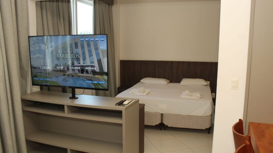 Deluxe Suite, 1 Bedroom | Memory foam beds, minibar, free WiFi, bed sheets
