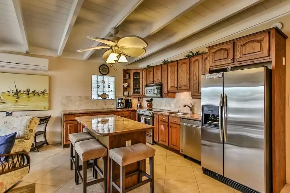 Gourmet Kitchen Complete With Island For Cooking, Dining & Congregating!