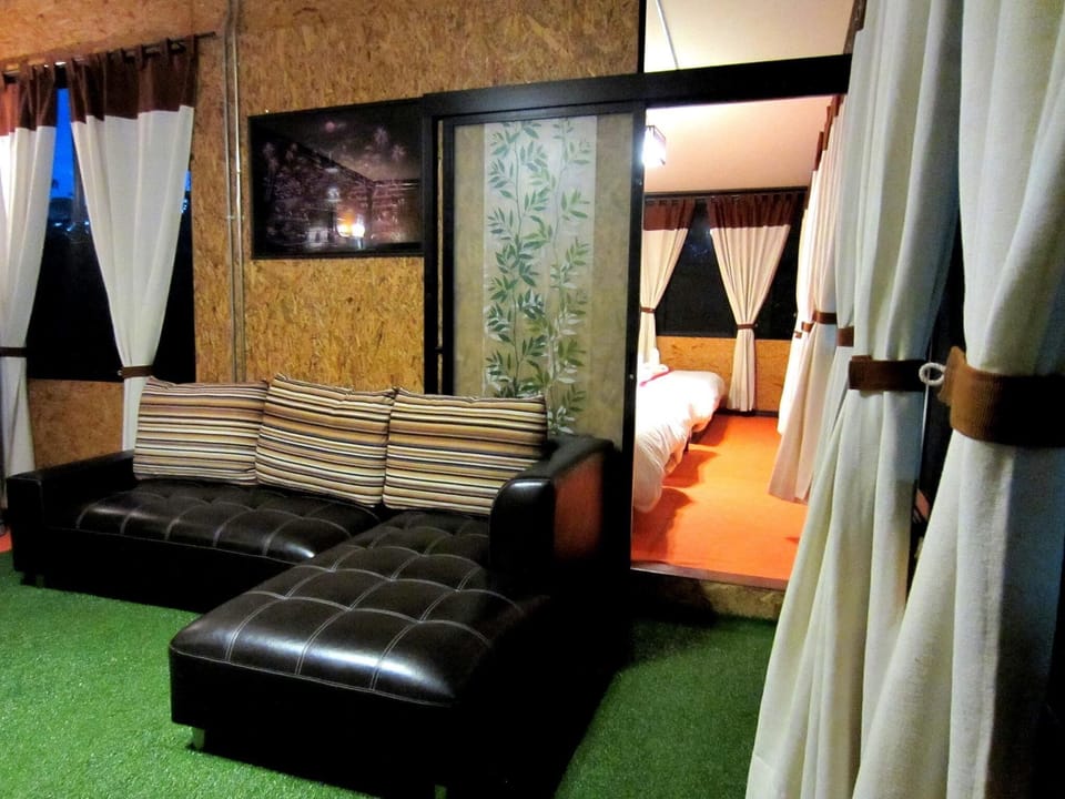 Family Suite | Minibar, in-room safe, desk, iron/ironing board