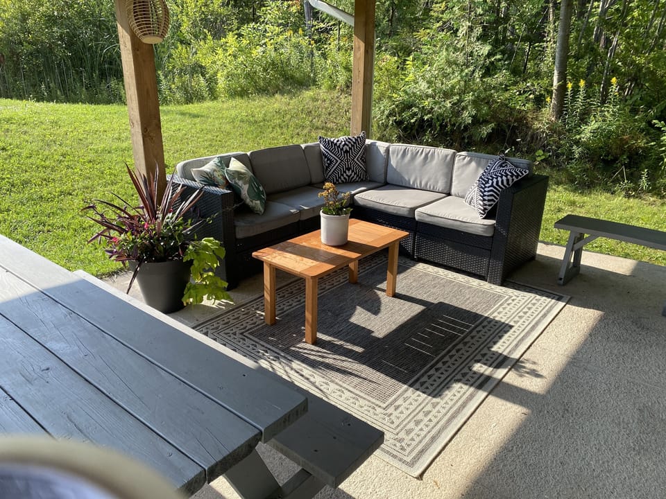 Enjoy your morning coffee on our backyard patio.