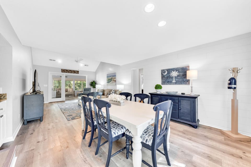 A large farm table seats six