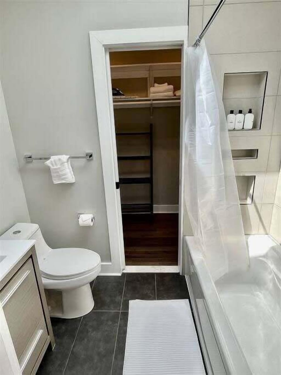 Full bathroom comes complete with tub. 
