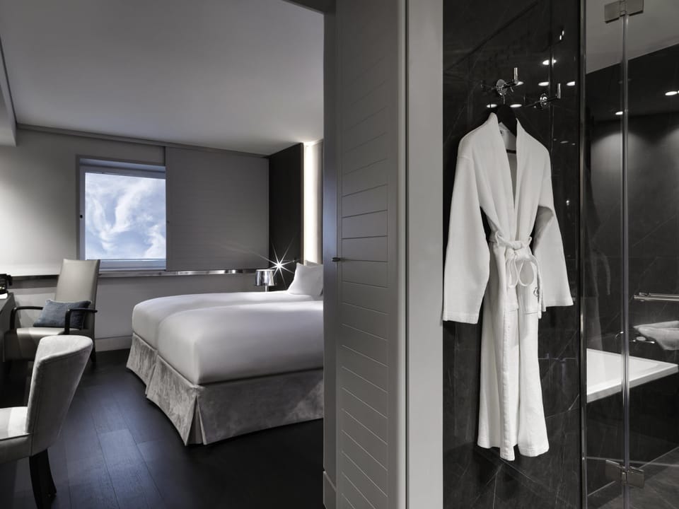 Premium bedding, memory foam beds, in-room safe, desk