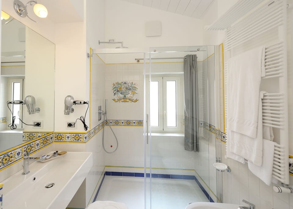 Classic Double Room | Minibar, in-room safe, desk, laptop workspace