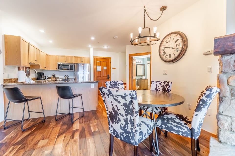 You'll love gathering around the stylish dining table while meals simmer in your fully-equipped kitchen, complete with breakfast bar seating.