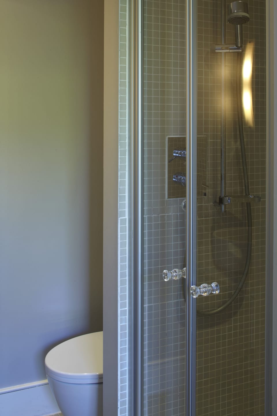 Compact Studio | Bathroom | Shower, hair dryer, towels