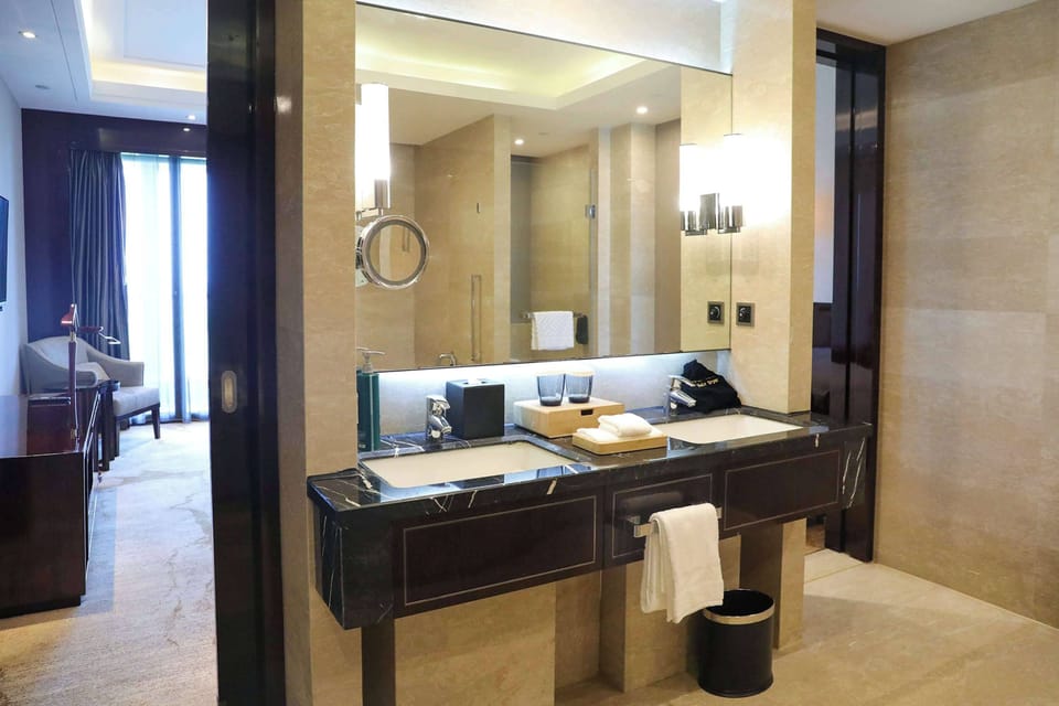 King One Bedroom Suite | Bathroom | Separate tub and shower, deep soaking tub, free toiletries, hair dryer