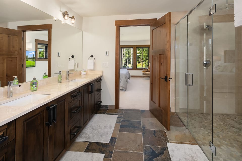 Fit for a King: - Dual sinks in the master bath.
