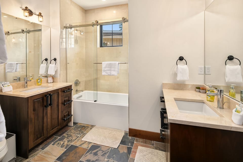 Fit for a King: - Main floor master bath with double sinks.