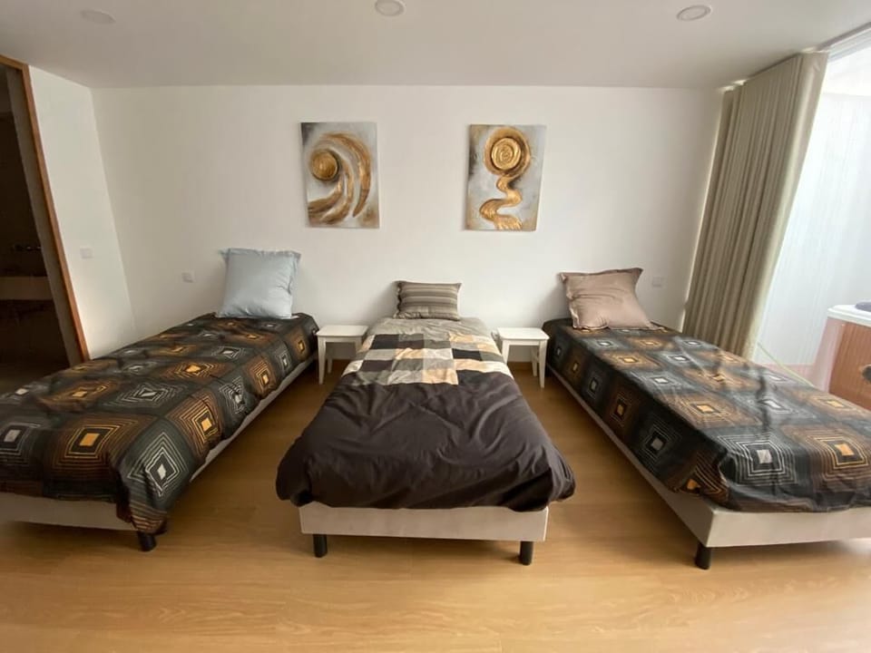Quarto 3 camas