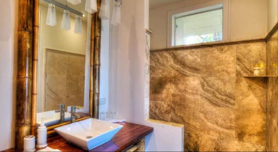 Shower, rainfall showerhead, designer toiletries
