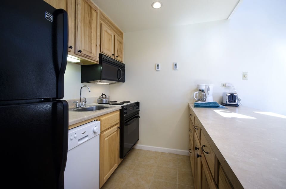 Your fully-equipped kitchen features everything needed for home cooking, with ample counter space and modern appliances.