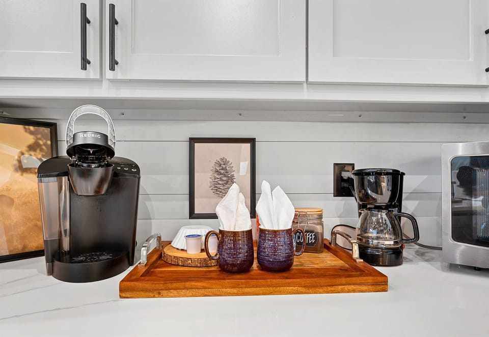 Start your morning with a cup of your favorite brew in this cozy nook, where every detail adds to the cabin's charm
