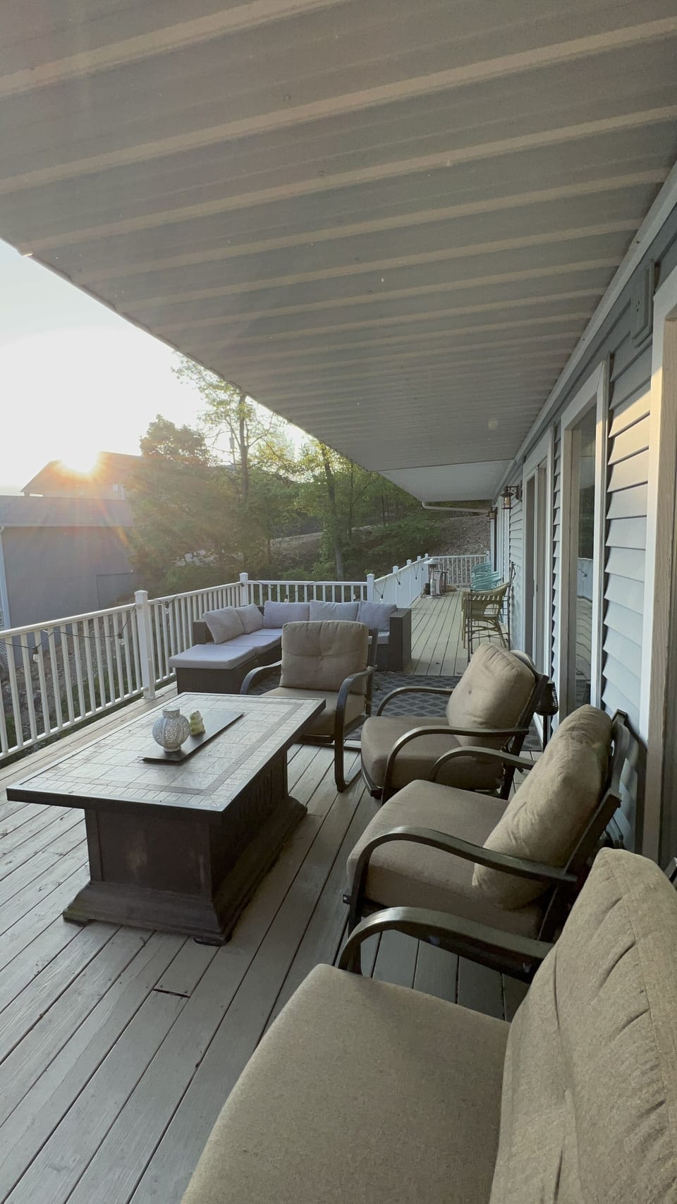 Spacious deck with fire pit Blackstone, grill and comfy seating 
