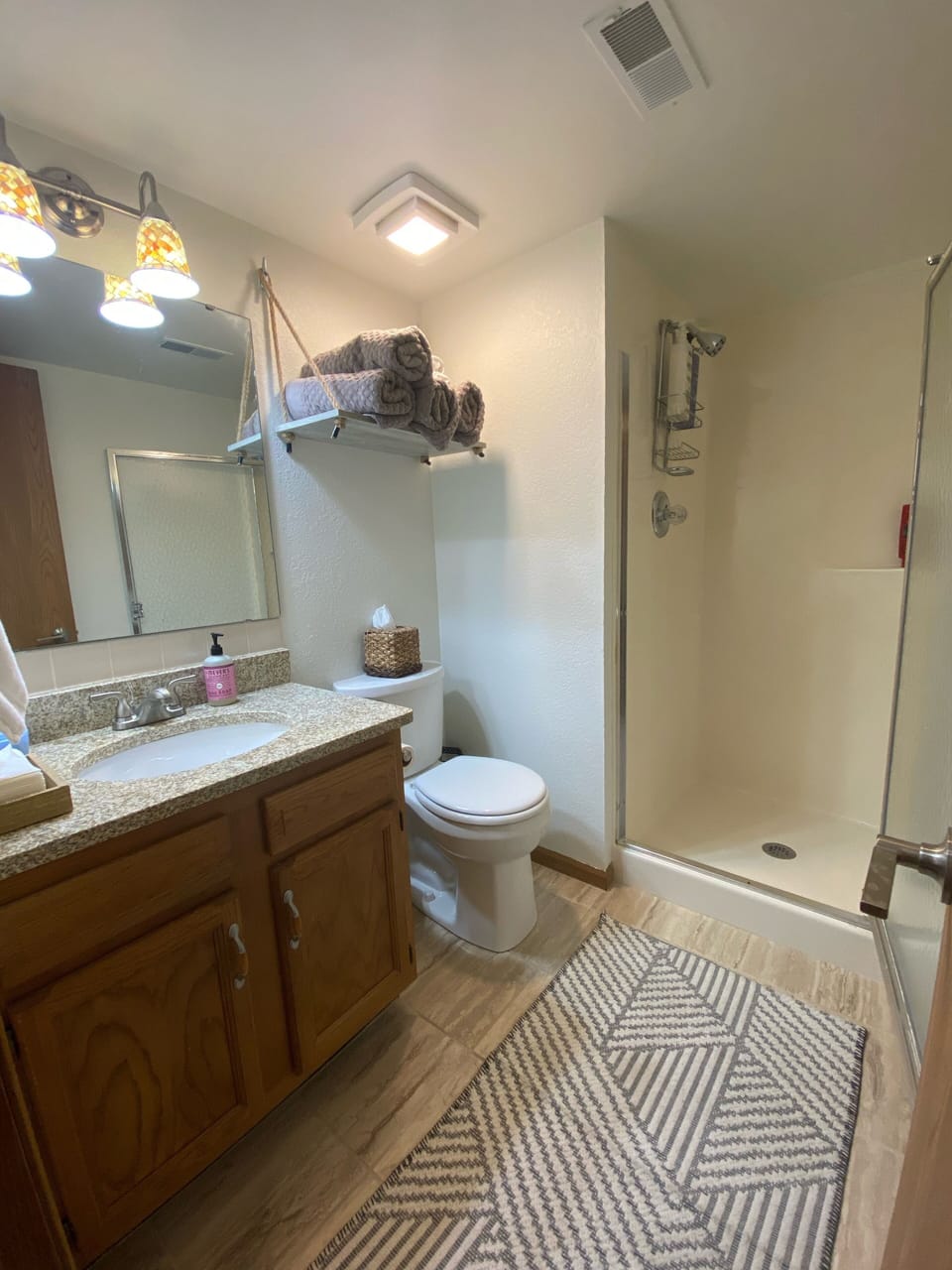 Main floor bathroom with a bonus shower. 