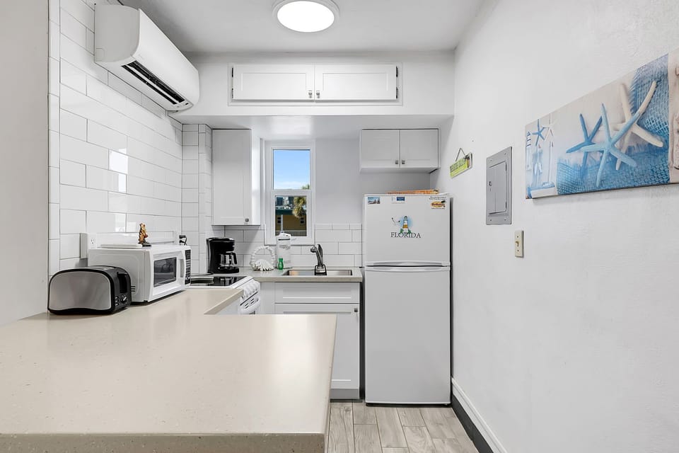 Appliances: Includes full size refrigerator, stove/oven, microwave, toaster and coffee maker.
