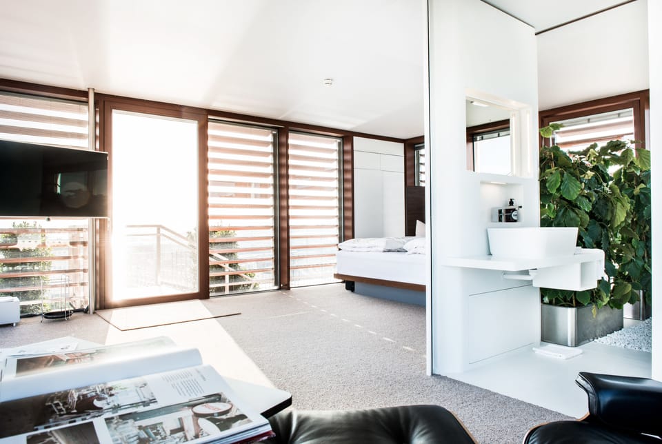 Loftcube | Bathroom | Shower, rainfall showerhead, hair dryer, towels
