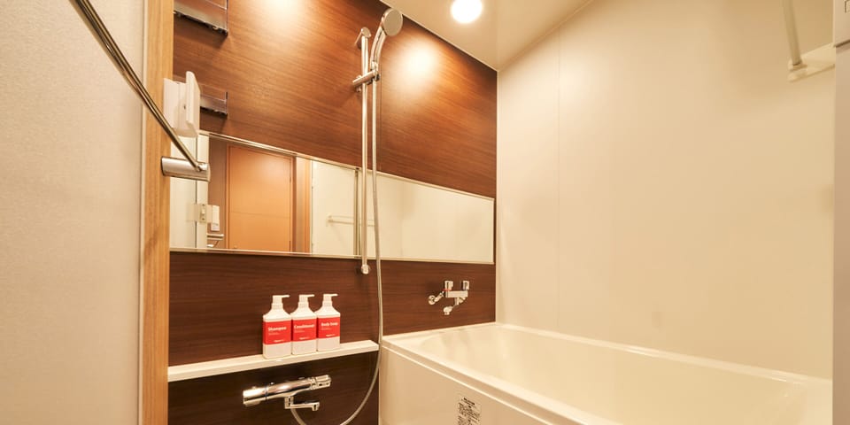 Twin Room, Separated Bath and Toilet, Non Smoking | Bathroom | Free toiletries, hair dryer, slippers, electronic bidet