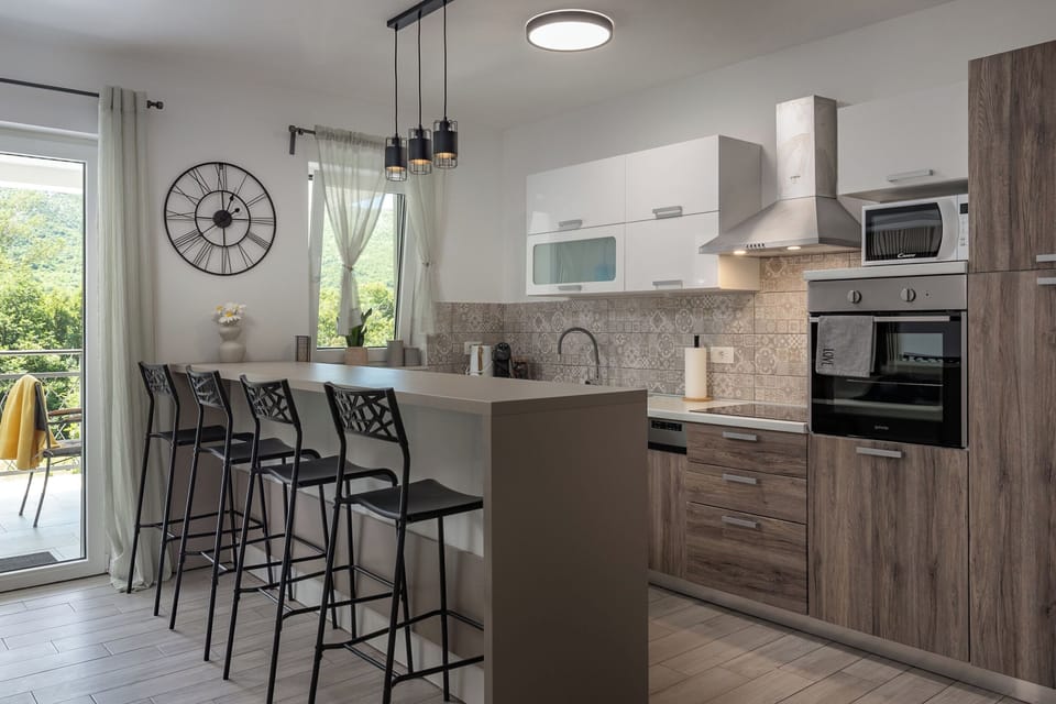 Villa | Private kitchen | Fridge, microwave, oven, stovetop