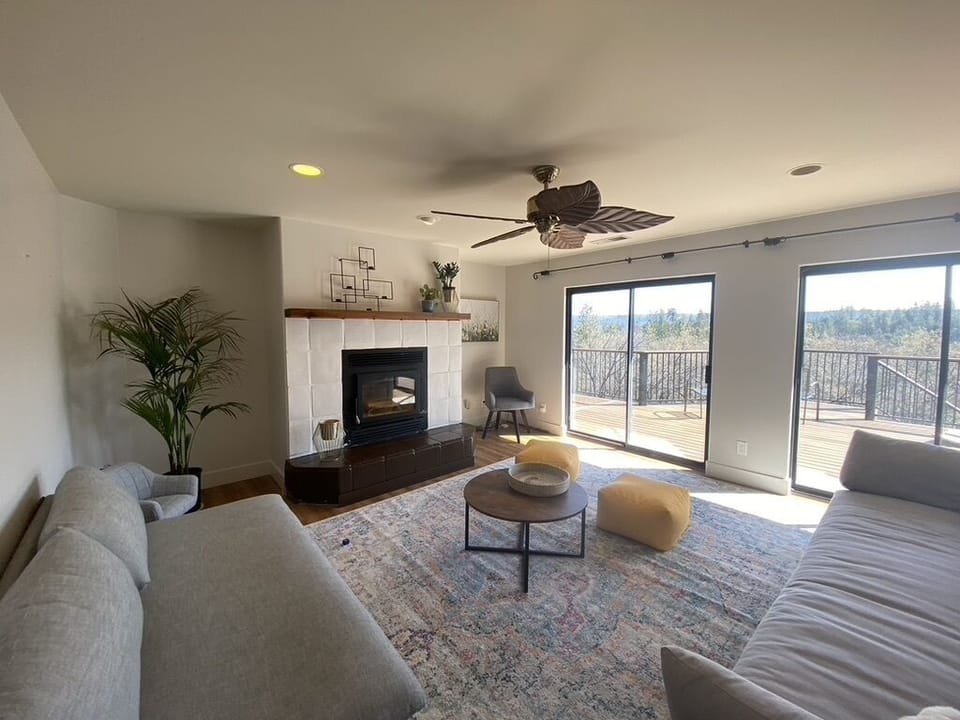 Relaxing, contemporary living room with great views. 