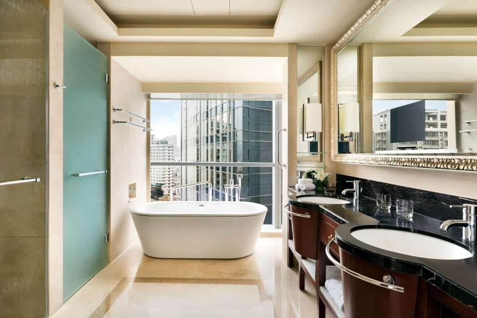 Valley Wing, Executive Suite, 1 King Bed | Bathroom | Separate tub and shower, free toiletries, hair dryer, bathrobes