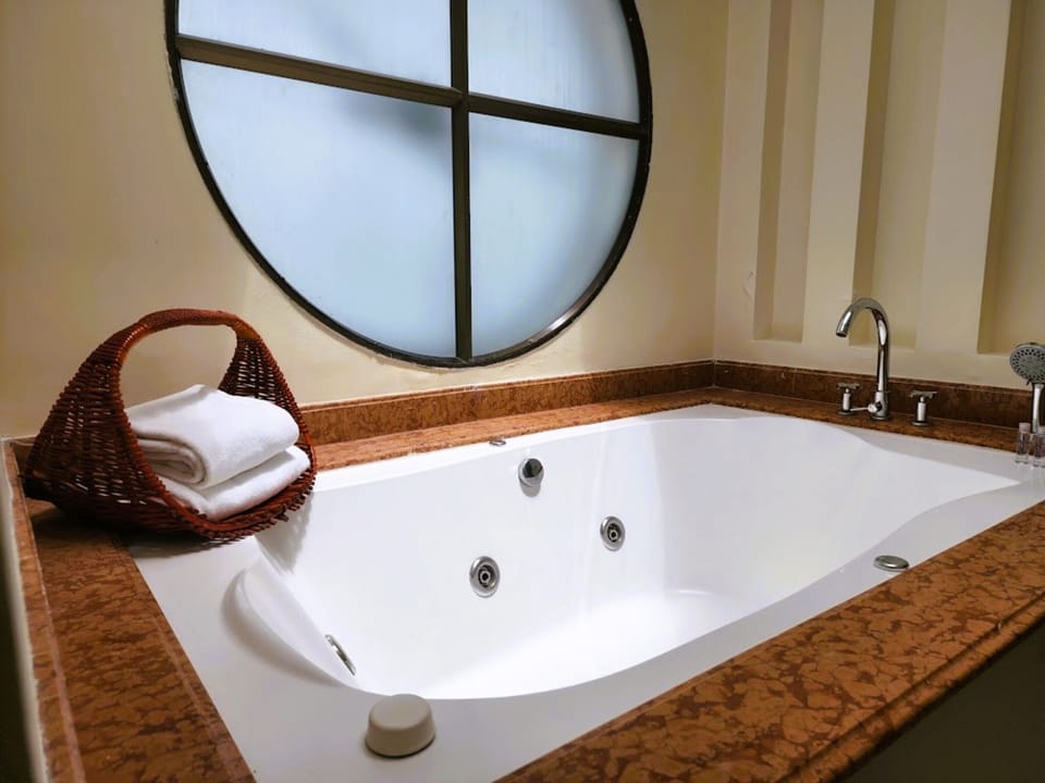 Penthouse, Hot Tub | Bathroom | Free toiletries, hair dryer, towels