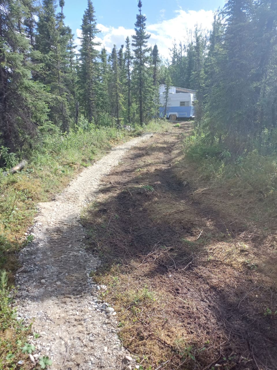 There is a foot gravel foot trail to get to the camper