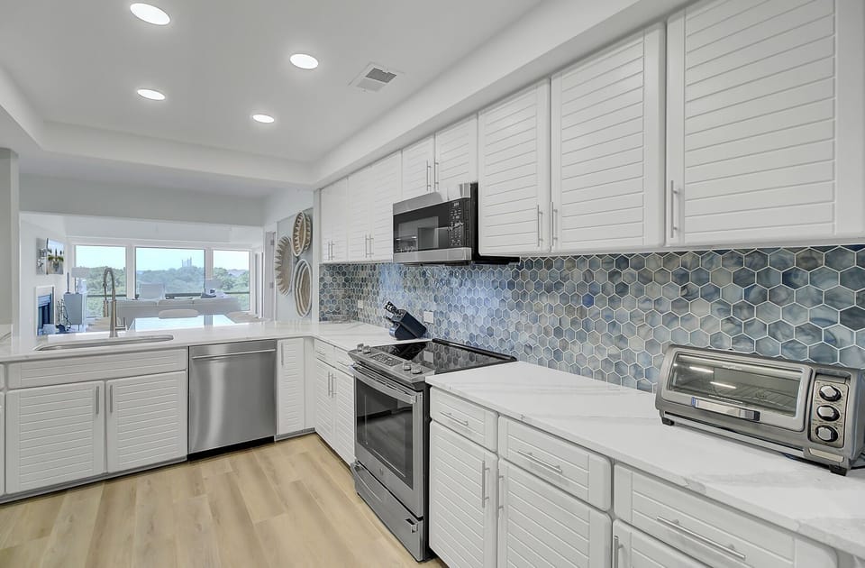 The kitchen features updated appliances.