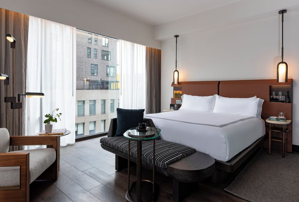 Skyline Studio | Premium bedding, down comforters, pillowtop beds, minibar