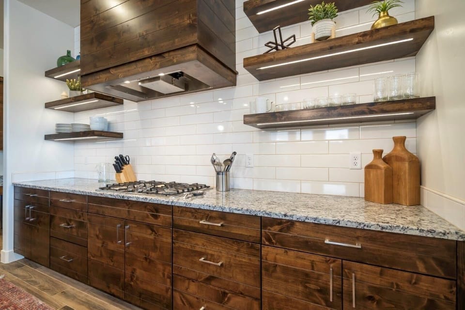 Kitchen is stocked with appliances and utensils for cooking