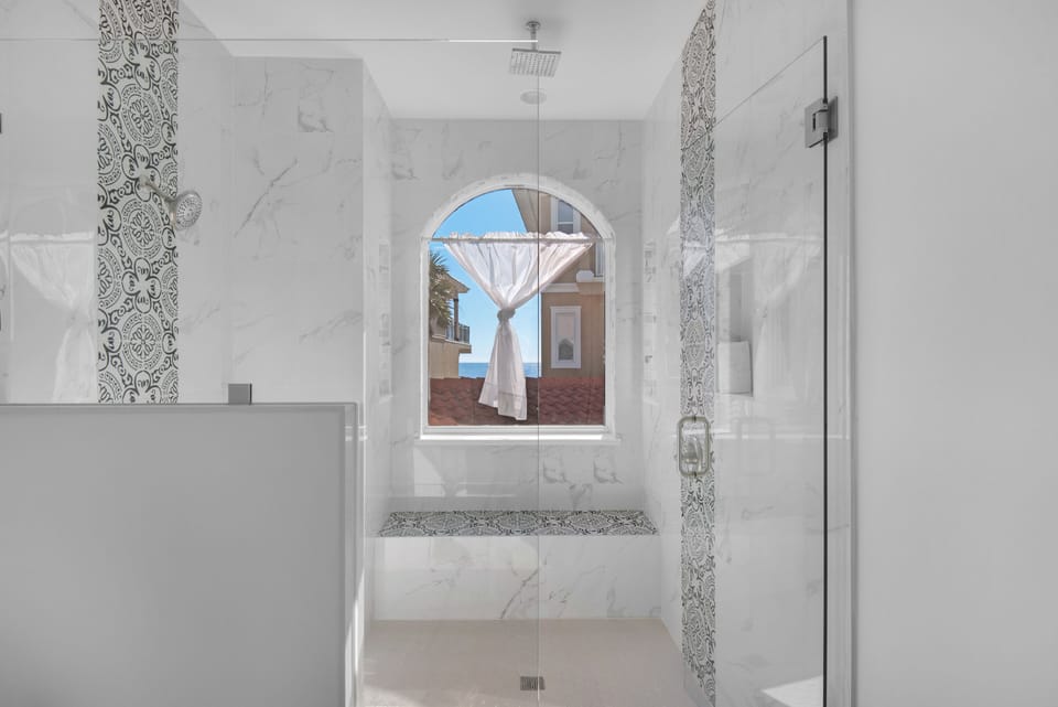 Level 3 / 2nd Master Bath - day light one way window tinted.  Gulf View in shwr