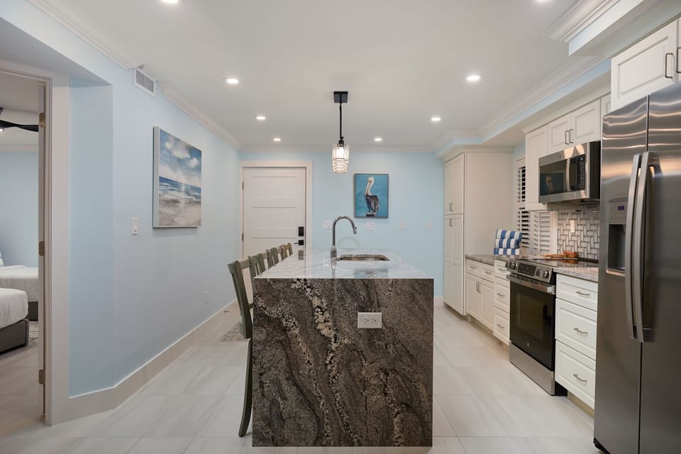 Full Kitchen with island and seating.