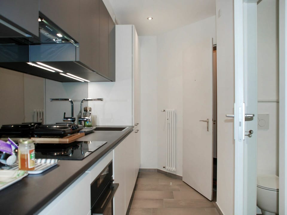 Cabinetry, Countertop, Property, Sink, Building, Kitchen Sink, Kitchen Stove, Tap, Kitchen Appliance, Wood