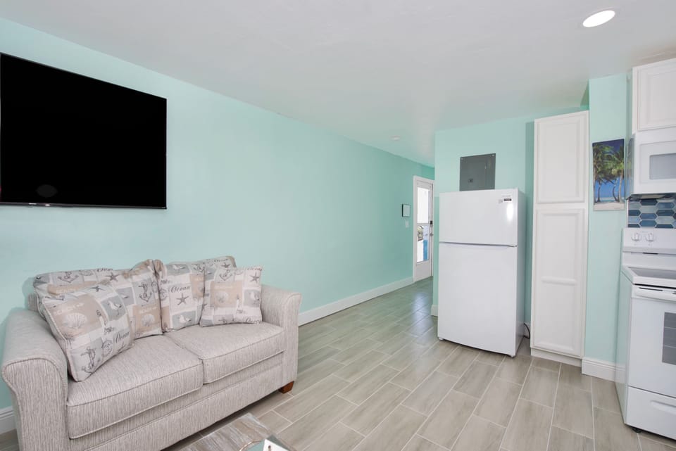 Living Room to Entry and Bedroom