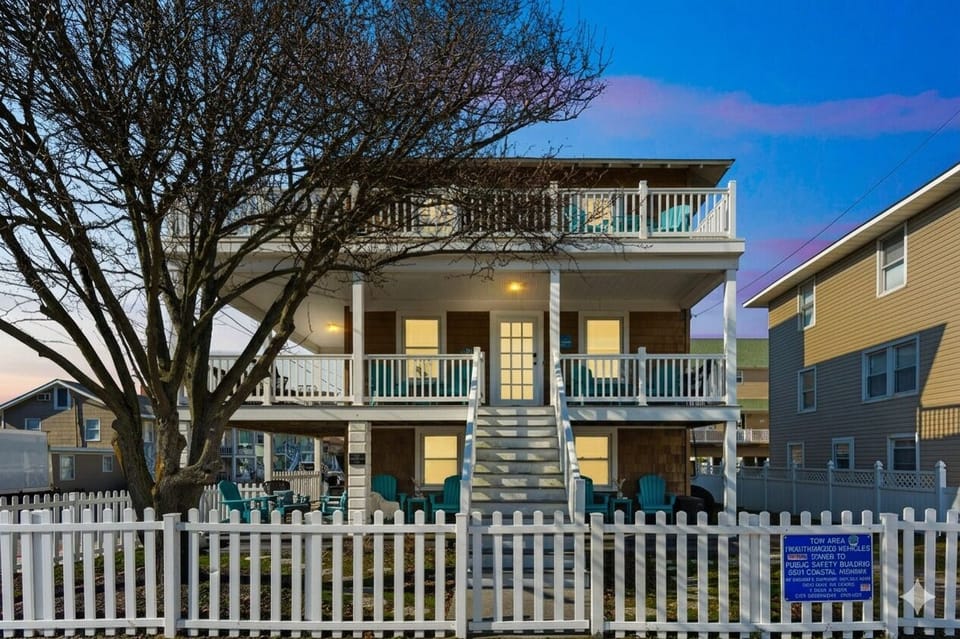 Front view of whole house. First level is Ripple