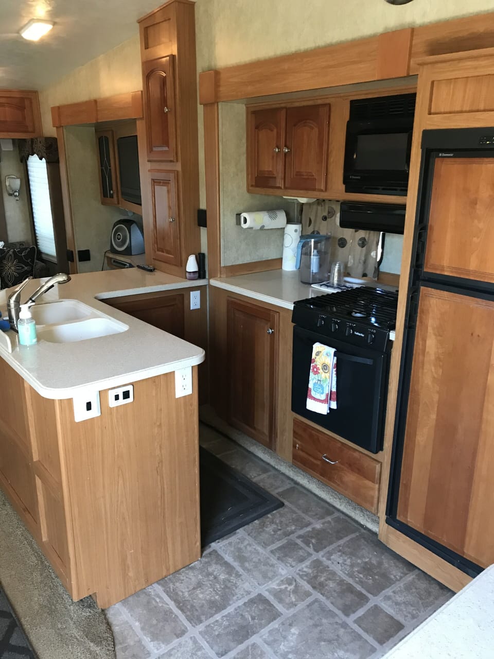 Full Kitchen with Sink , Oven, Stove top, Microwave and Refrigerator. 