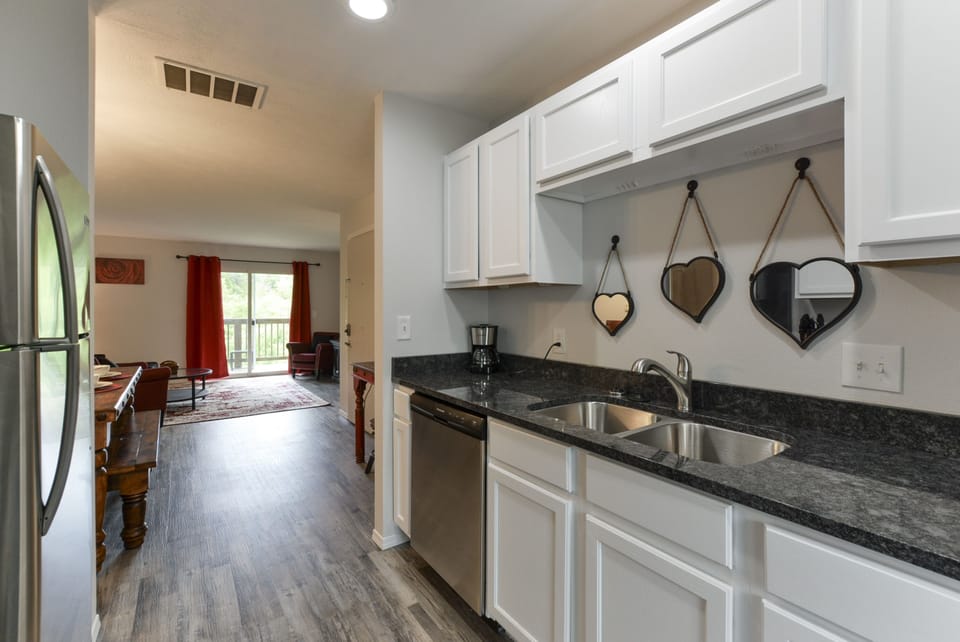 Kitchen of unit 3 looking into the family room