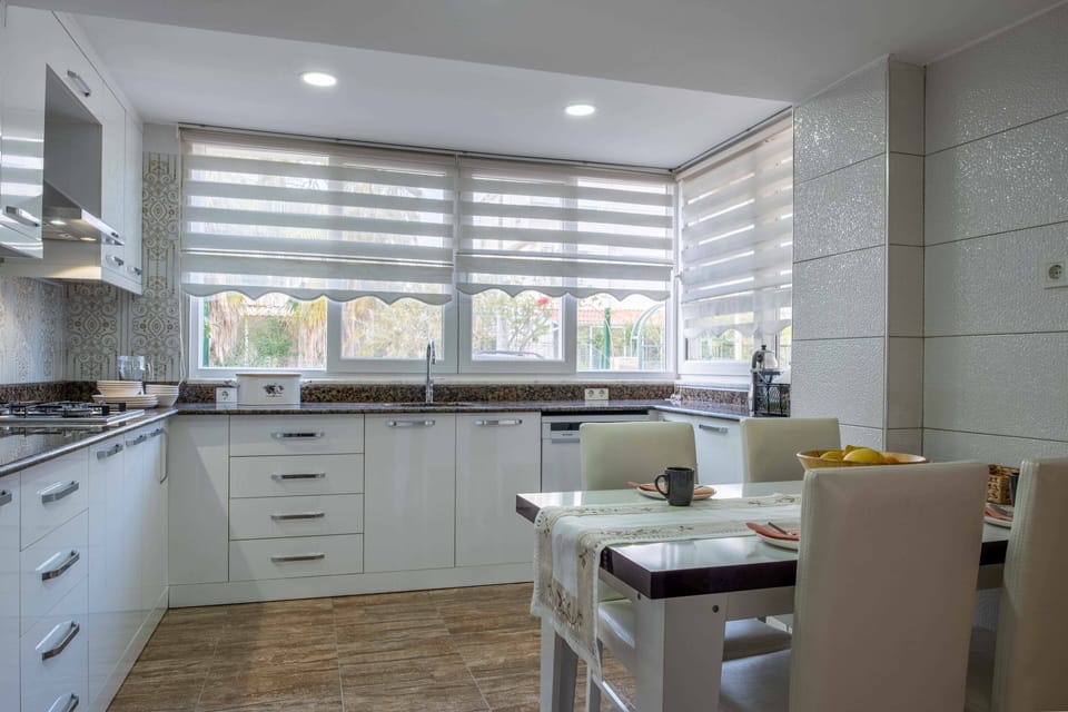 Villa | Private kitchen | Fridge, microwave, oven, stovetop