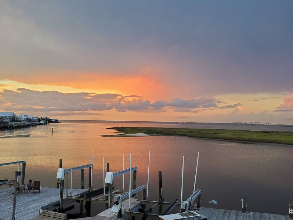 View of the Bay for Sunset at Dauphin Island. There is no boat lift at this unit