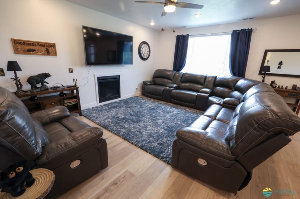 Family Room with working fireplace & large TV