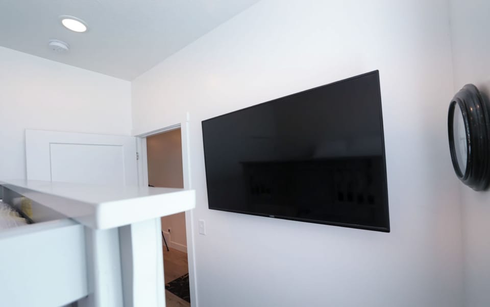 Main Level Bedroom - sleeps 4 and has TV