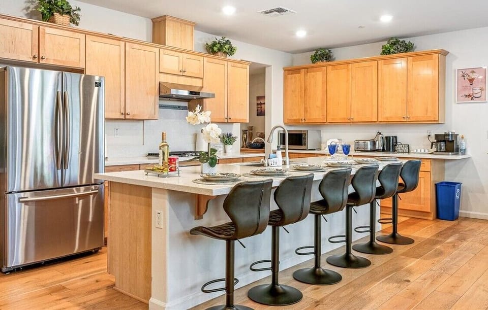 Professional-grade chef's kitchen with a massive island for easy group dining