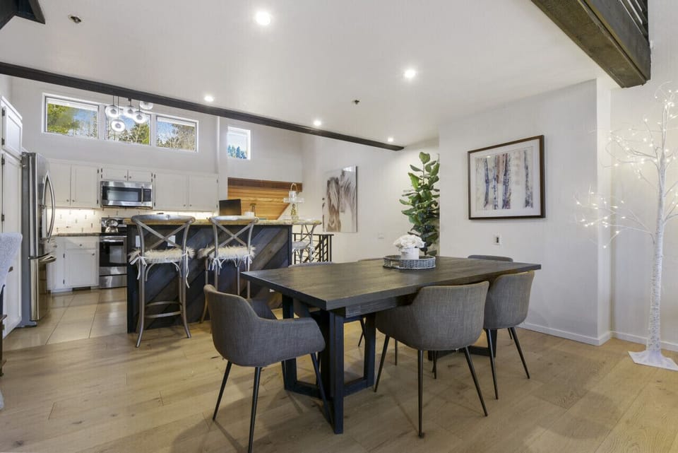 Dining Table with Seating for Six Plus Four More at Breakfast Bar