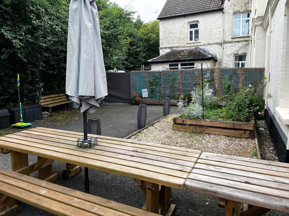 Tables and benches to seat 16