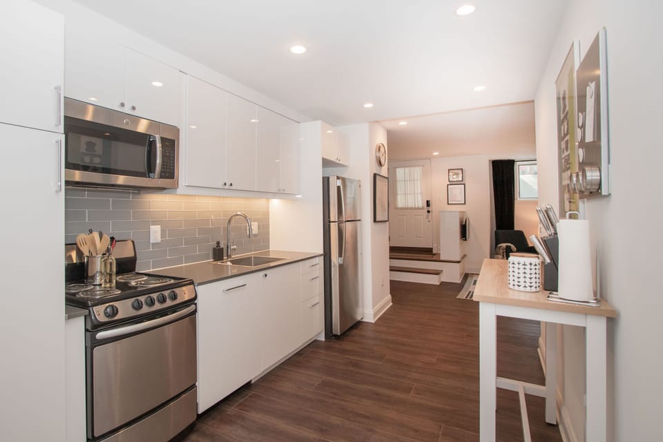 Open kitchen with stainless appliances
