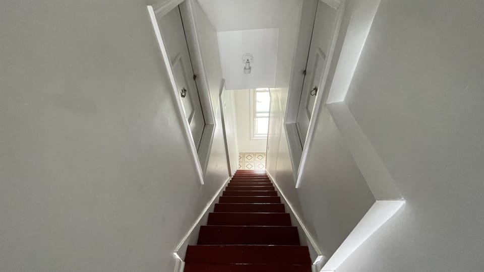 Stairs looking down from upstairs