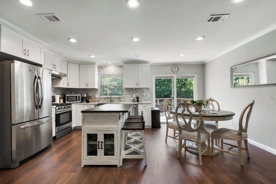Access to upper level deck from kitchen/Dining area